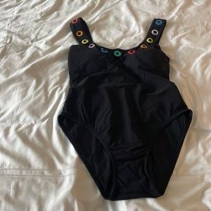 Black swim suit with color details on neckline